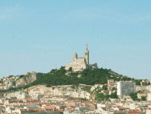Scenic view of Marseille, France, featuring Notre-Dame de la Garde on a sunny day.